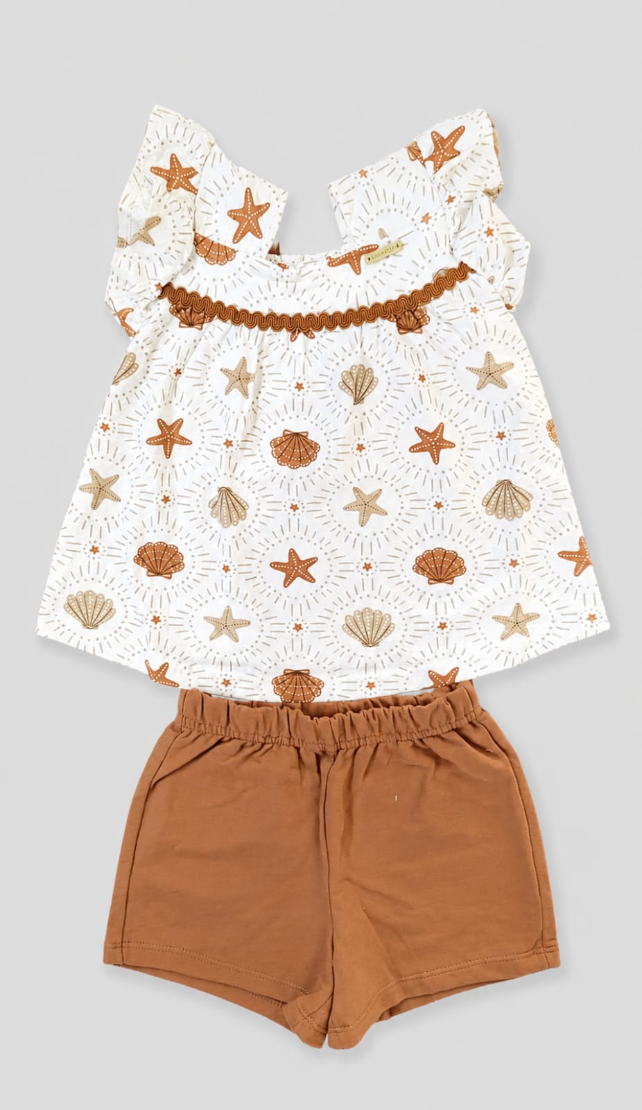 Conjunto Infantil Feminino Blusa em Malha Nikko com Short em Moletom Estampa Marinha