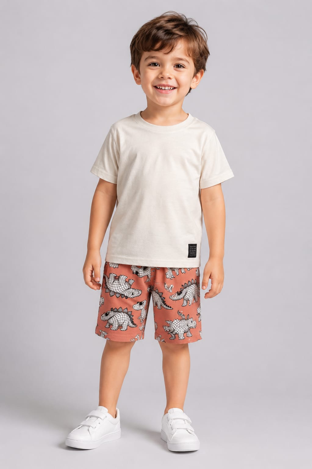 Conjunto Infantil Masculino Camiseta em Malha Penteada e Short em Moletom Estampa Dinossauros