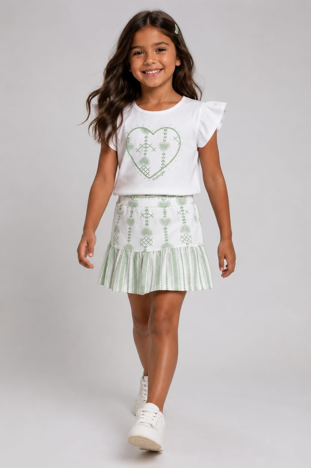Conjunto Infantil Feminino Blusa em Malha Nikko e Saia com Short Interno
