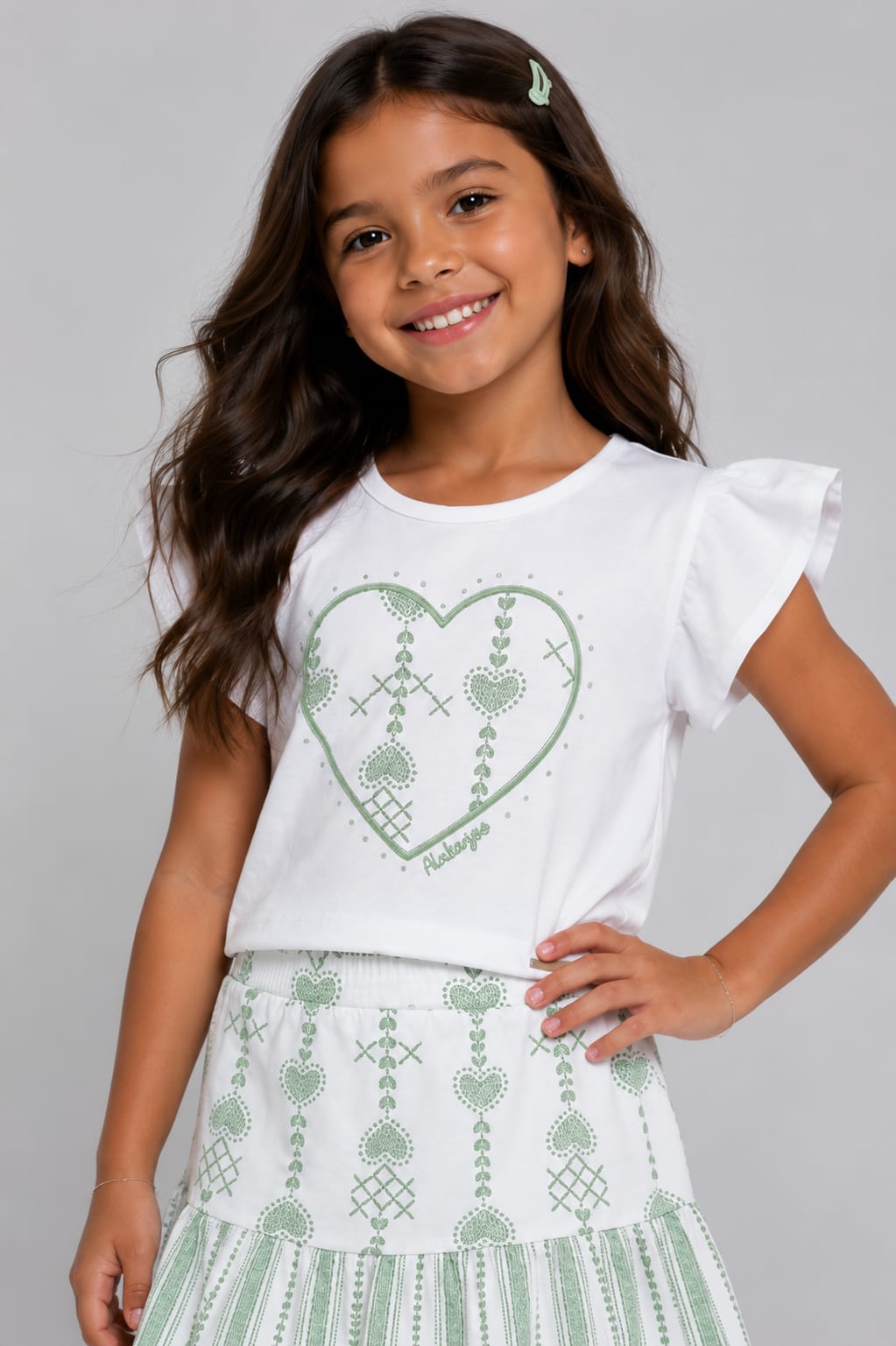 Conjunto Infantil Feminino Blusa em Malha Nikko e Saia com Short Interno