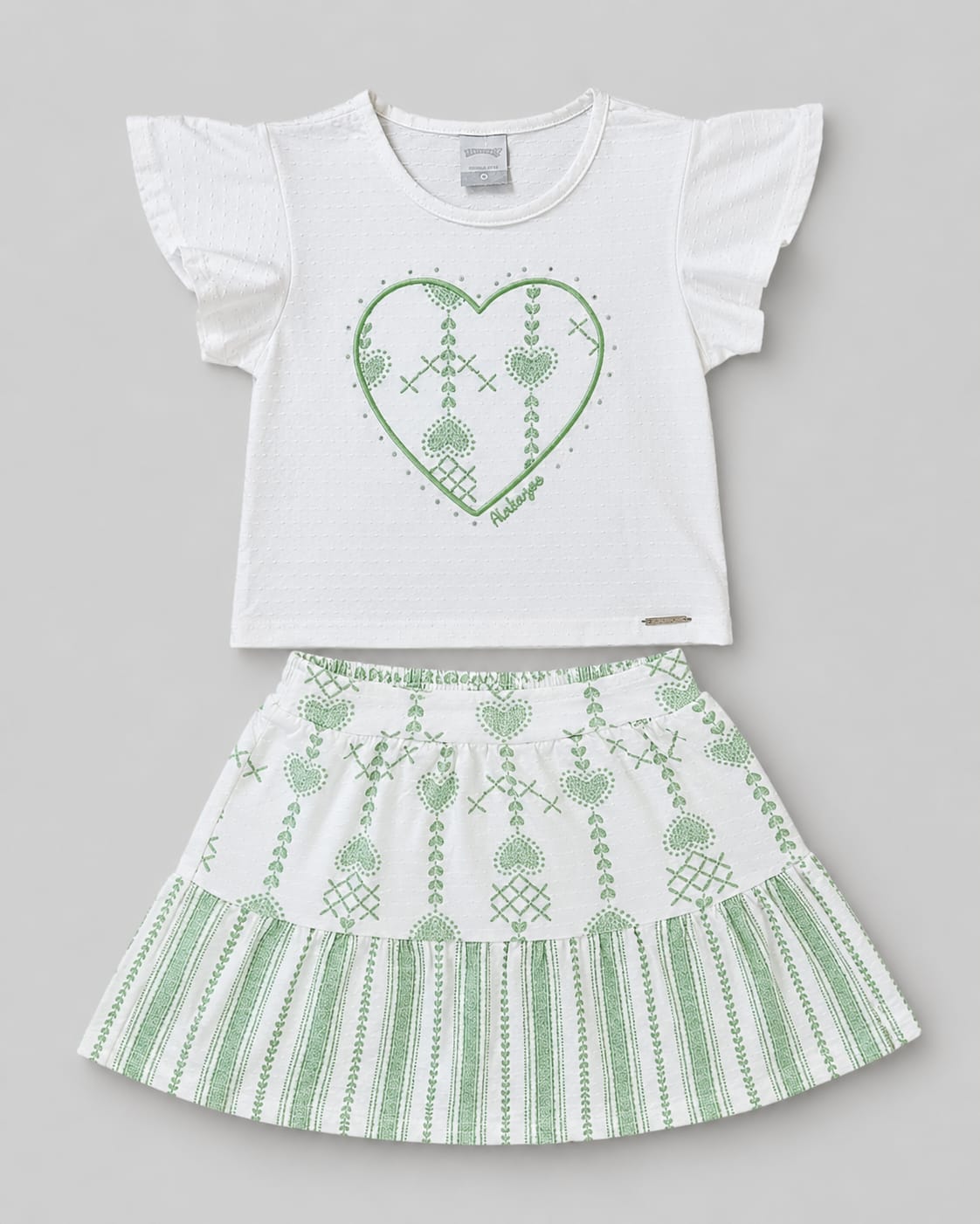 Conjunto Infantil Feminino Blusa em Malha Nikko e Saia com Short Interno