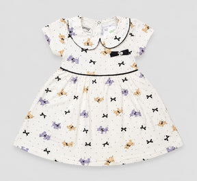 Vestido Infantil em Malha Nikko Estampado com Gola Boneca e Laço